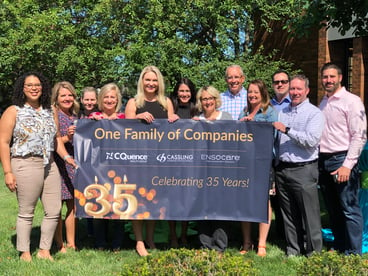 Cassling 35 Year Banner with Team Members