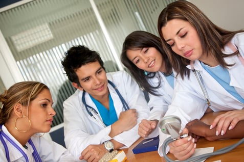 Doctors at a meeting trying the new equipment at the hospital