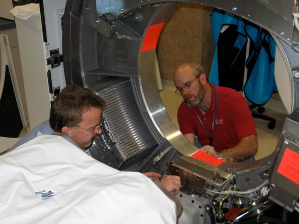 Jerry Glenn fixing a CT scanner