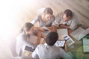 Team Analyzing Charts