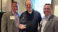 Mike Cassling and Kyle Salem award Terry Hingtgen with the 2022 Bob Cassling Service Excellence Award