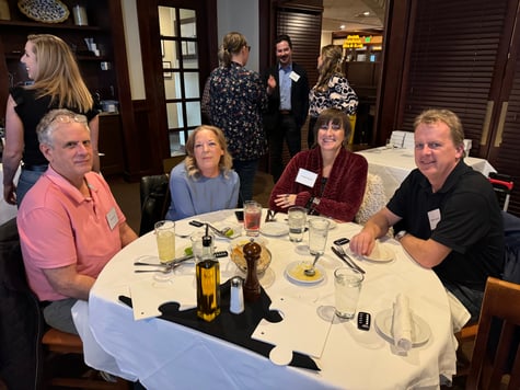 Dan Boone at dinner with colleagues